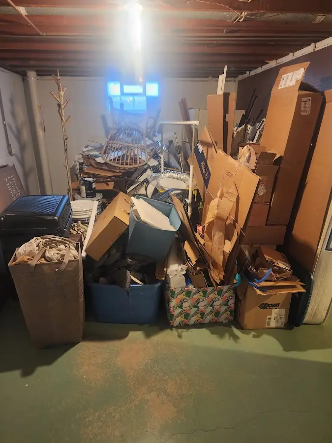 Roll-off dumpster container at job site for Concrete Dumpster Rental in Johnson Creek